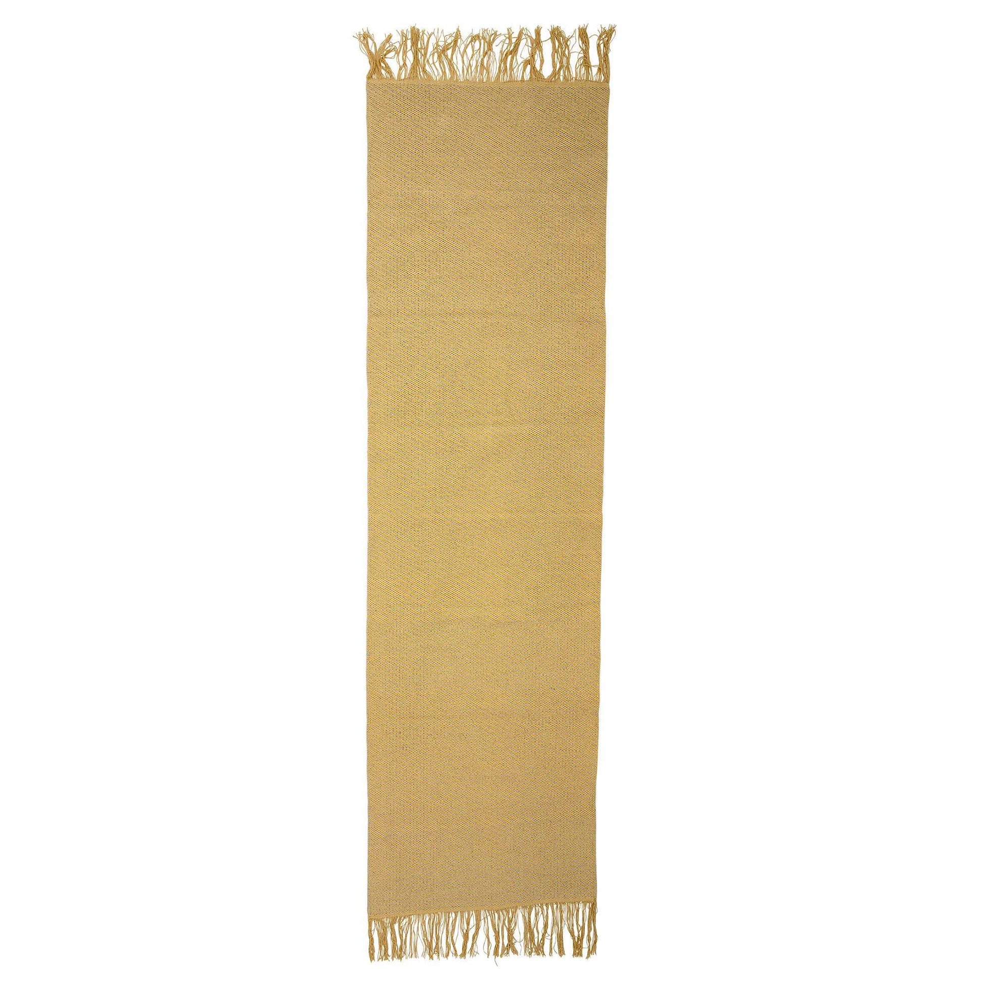 A yellow double sided rug can be used either side.  Dimensions: L240xW70 cm  Material: Cotton  Spot Clean Only